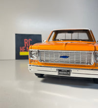 Maisto 1/18 Scale - 1974 Chevrolet C10 Cheyenne Super  - Orange Diecast Model.