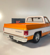 Maisto 1/18 Scale - 1974 Chevrolet C10 Cheyenne Super  - Orange Diecast Model.