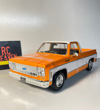 Maisto 1/18 Scale - 1974 Chevrolet C10 Cheyenne Super  - Orange Diecast Model.
